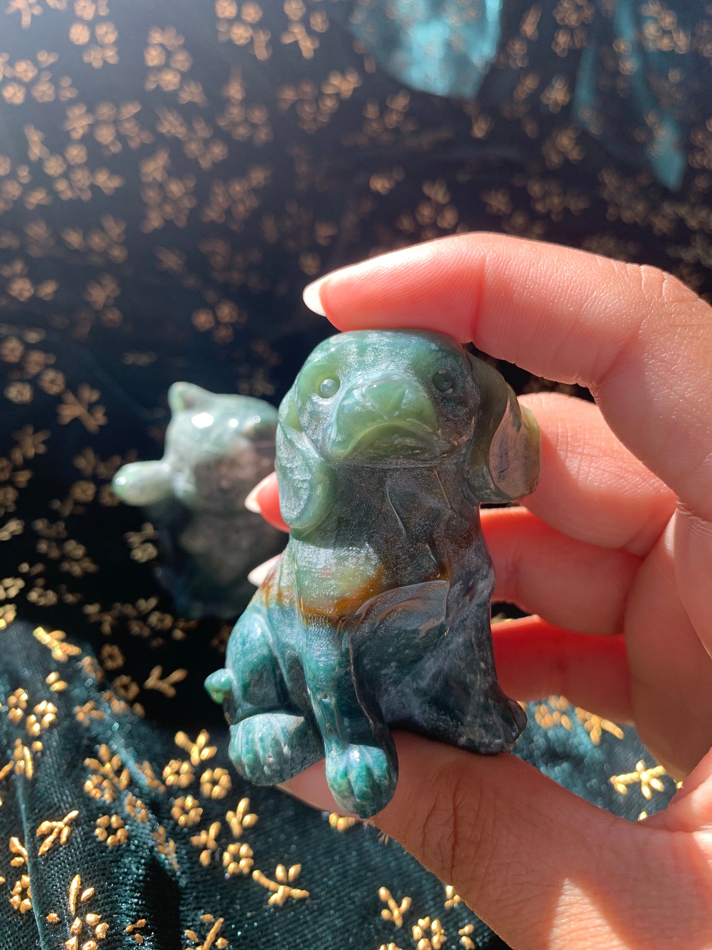 ocean jasper dog and lucky cat carvings