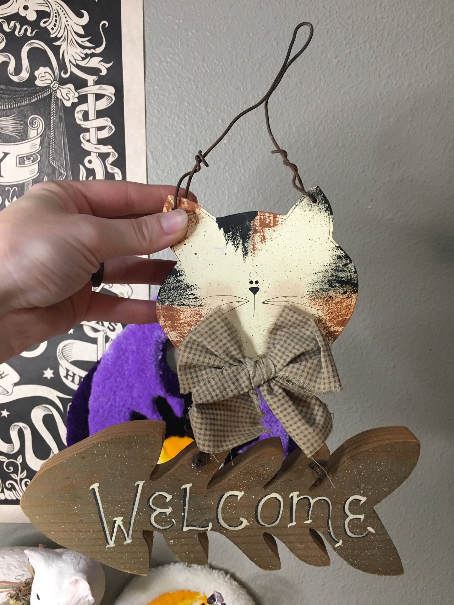 wooden cat welcome sign