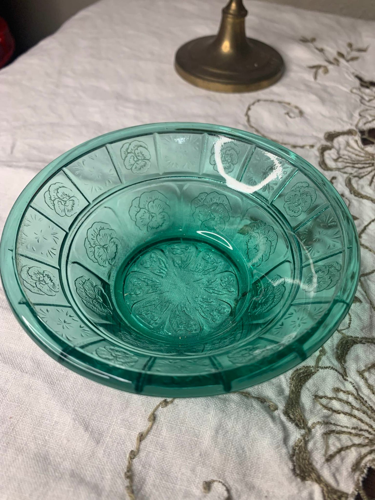 teal glass bowl with pansies