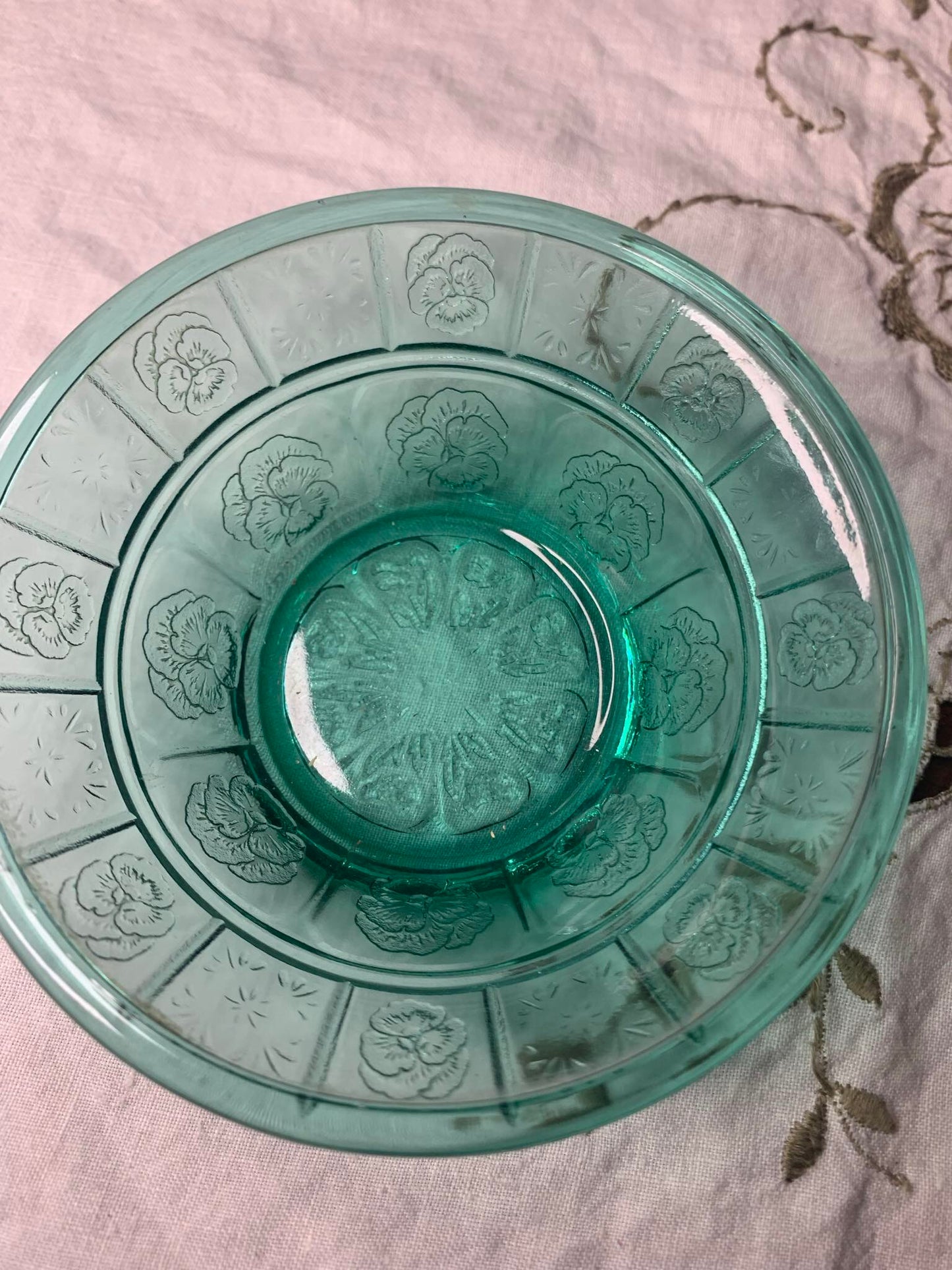 teal glass bowl with pansies